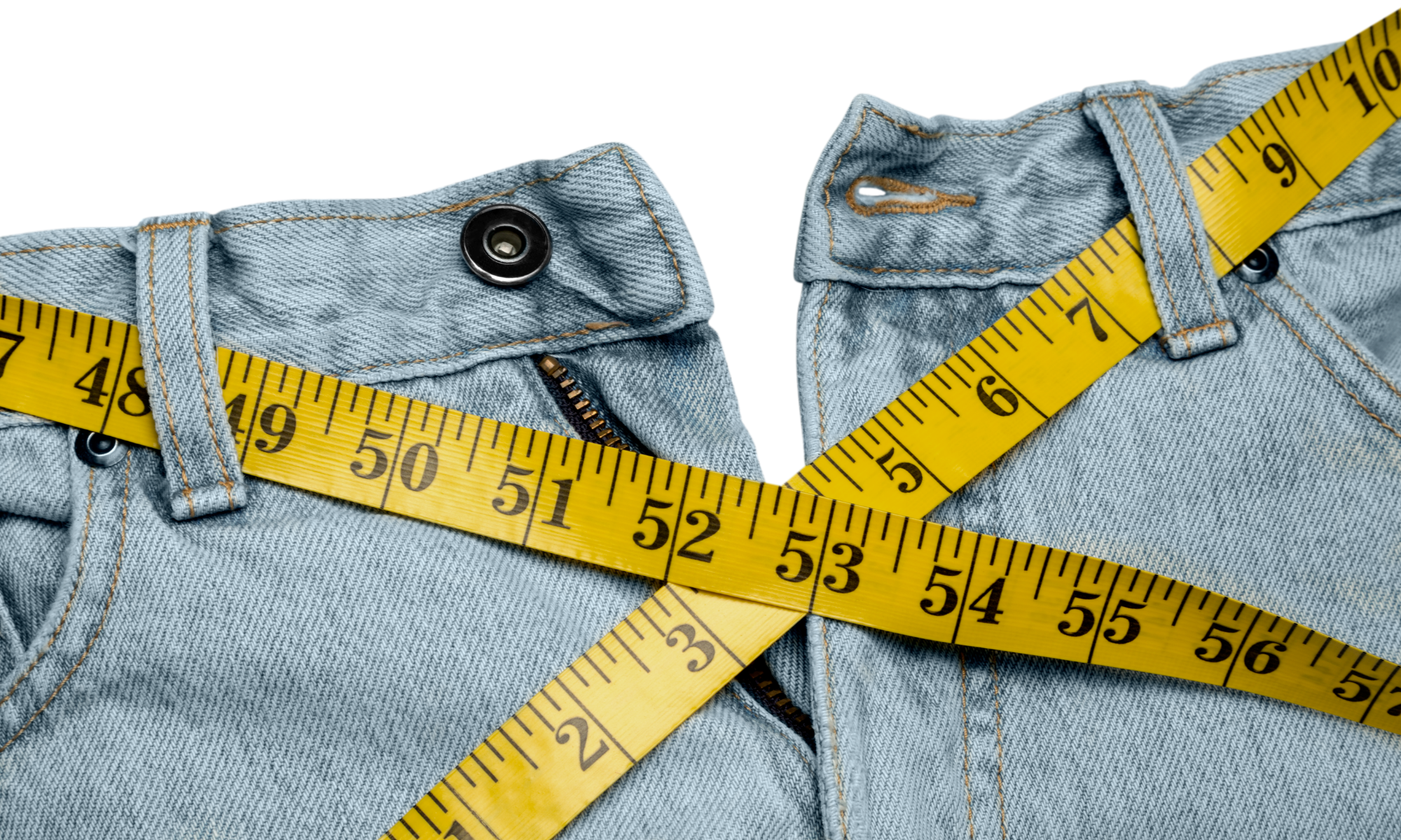 A pair of jeans with a measuring tape threaded through the belt loops A pair of jeans with a measuring tape threaded through the belt loops