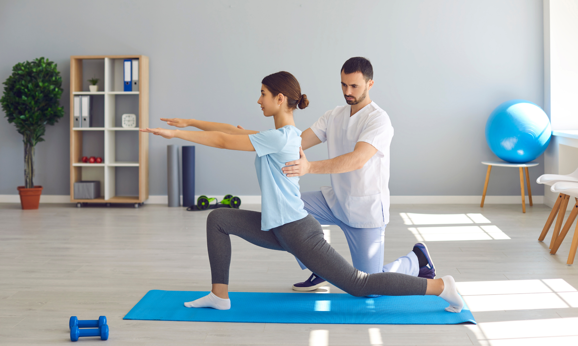 Woman does gentle exercise for weight management with the help of trainer Woman does gentle exercise for weight management with the help of trainer