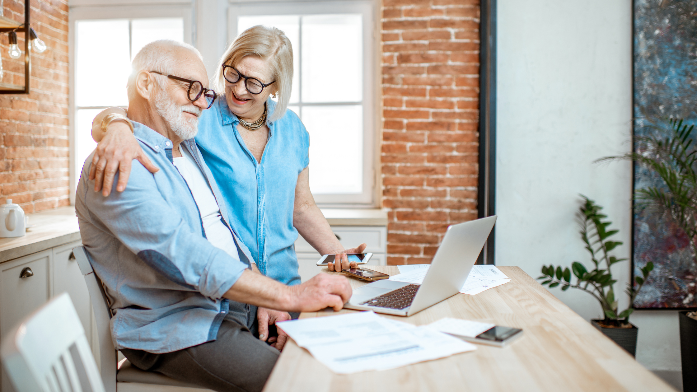 senior couple sitting at a brightly lit counter, happy senior couple sitting at a brightly lit counter, happy